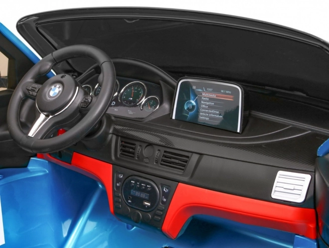 BMW X6M XXL pro 2 Kinder Blaue Farbe + Pilot + Eco-Leder + Sicherheitsgurte + Langsamer Start + MP3 + LED