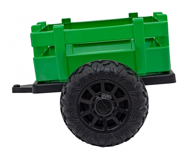 Kindertraktor mit grünem Anhänger