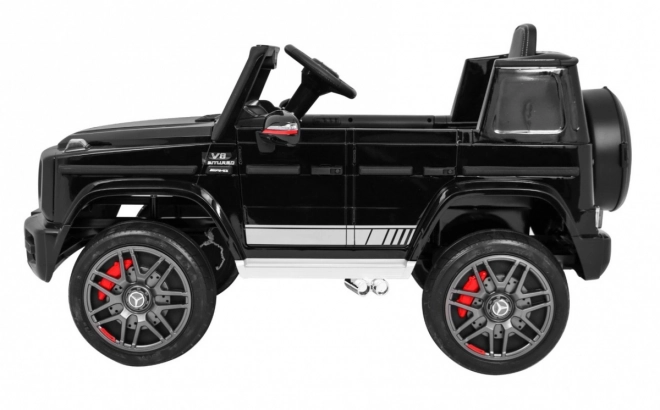 Mercedes AMG G63 für Kinder Lack schwarz + Fernbedienung + MP3 LED + langsamer Start + EVA + Gurte