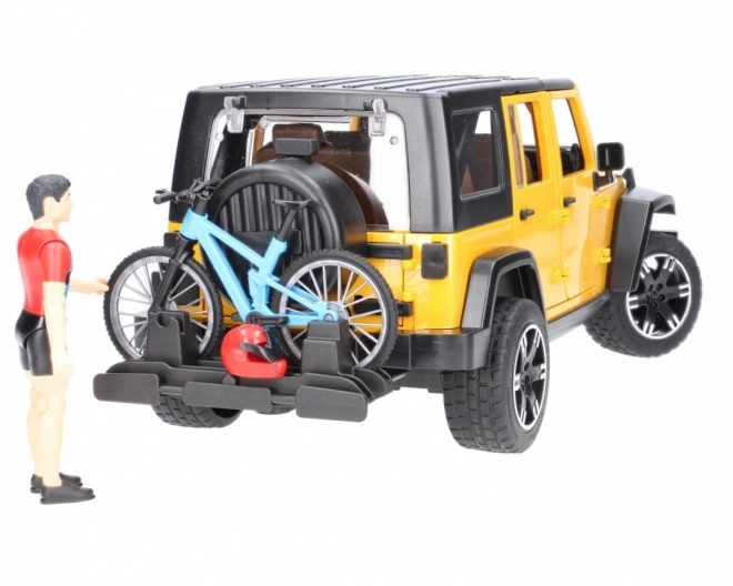 Jeep Wrangler Rubicon mit Radfahrer und Fahrrad von Bruder