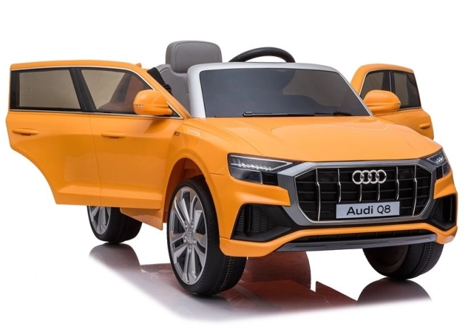 Gelber Audi Q8 Elektroauto für Kinder