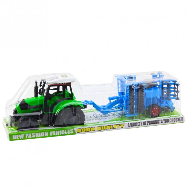 Großer Set Agrartraktor mit Scheibenegge