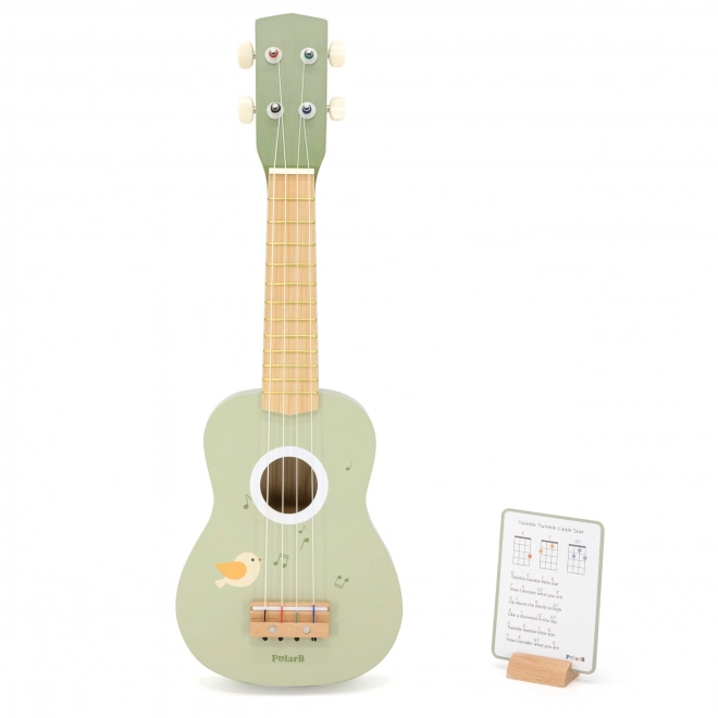 Grüne Ukulele aus Holz für Kinder mit Noten