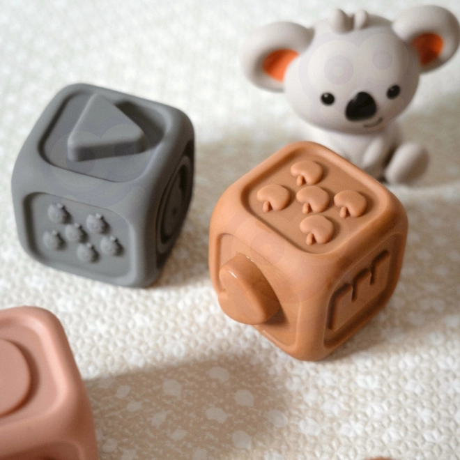 Woopie Baby Lernpyramide & Sensorische Bausteine 2 in 1 Beißring Zahlen