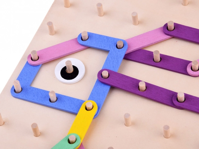 Montessori Holz-Puzzle mit farbigen Stäben und löschbarem Brett