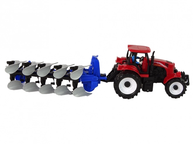 Roter Traktor mit Pflug Farm