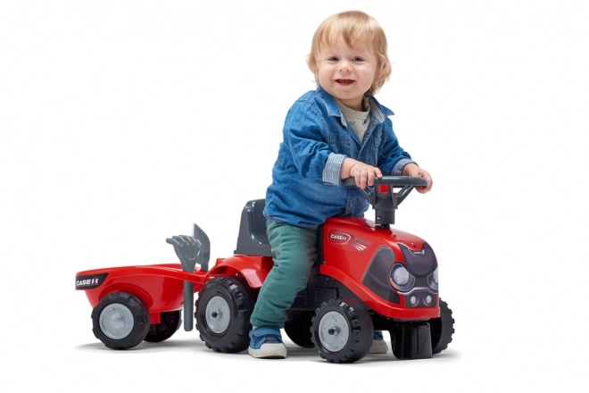 Falk Kinderrutscher Traktor mit Anhänger und Gartenwerkzeugen