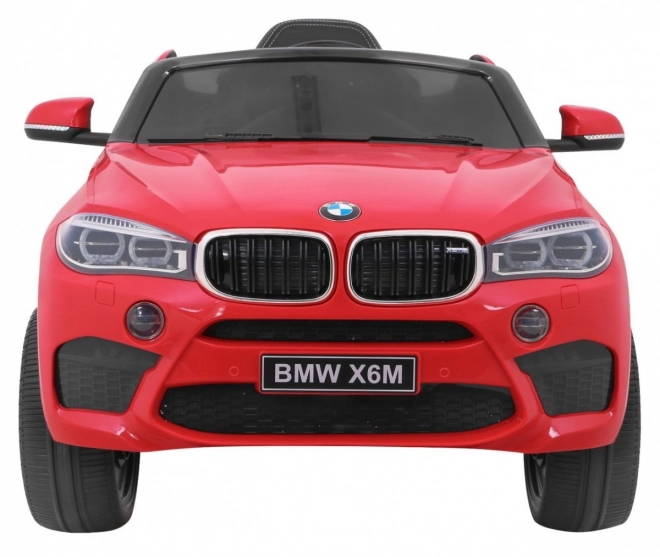 BMW X6M Elektrisches Kinderauto Rot + Fernbedienung + EVA + langsamer Start + Audiopanel + LED-Diode