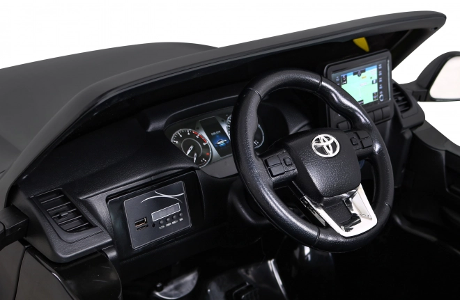 Toyota Hilux Batterie für Kinder schwarz + Antrieb 4x4 + Fernbedienung + 2 Gepäckträger + MP3-Radio + LED-Diode
