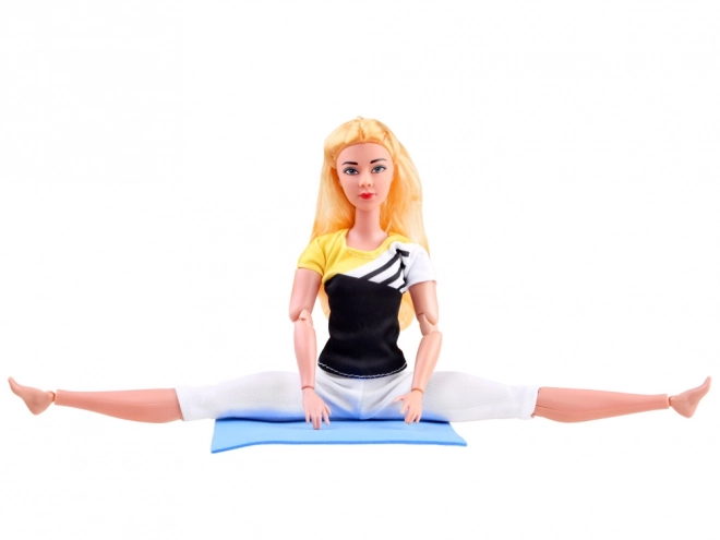 Gymnastikpuppe beim Yoga und Fitness