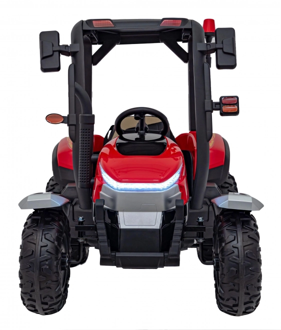 Traktor mit Anhänger rot