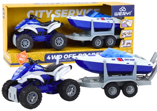 Polizei Quad mit Anhänger und Boot