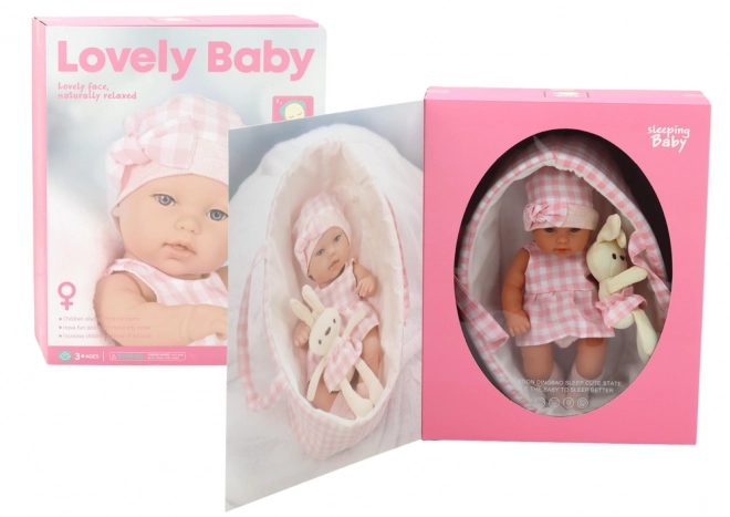 Baby Puppe mit Trage und Häschen in rosa kariertem Outfit
