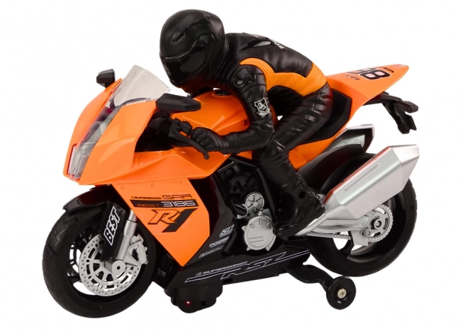 Orange Spielzeugmotorrad mit Fahrer und Sensoren