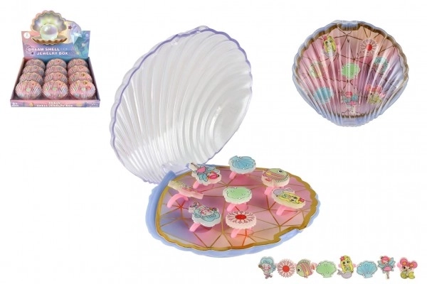 Plastikring Set in Muschelbox