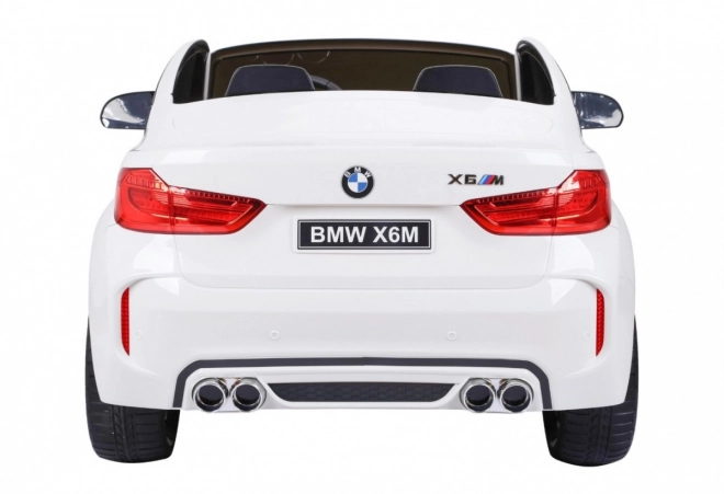 BMW X6M XXL pro 2 Kinder Weiß + Fernsteuerung + Eco-Leder + Sicherheitsgurte + langsamer Start + MP3 USB + LED