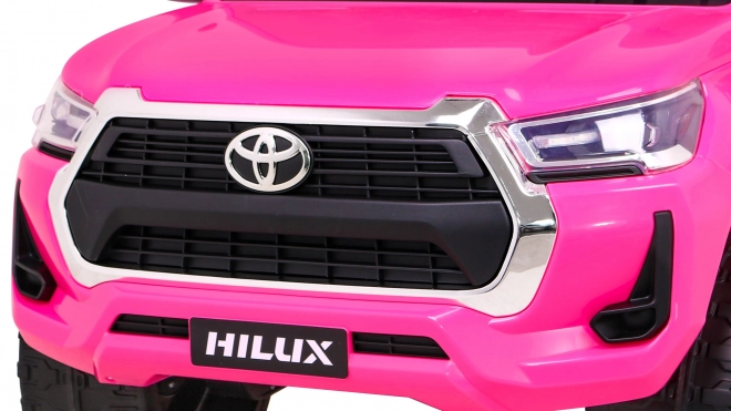Toyota Hilux auf Batterie für Kinder Rosa + Antrieb 4x4 + Fernbedienung + 2 Sitzplätze + MP3 Radio + LED