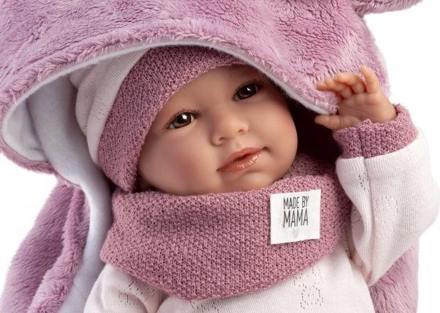 Realistische Baby-Puppe mit Geräuschen und weichem Stoffkörper