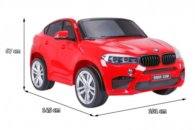 BMW X6M XXL pro 2 Kinder Rot + Fernbedienung + Ökoleder + Sicherheitsgurte + Langsamer Start + MP3 USB + LED-Leuchte