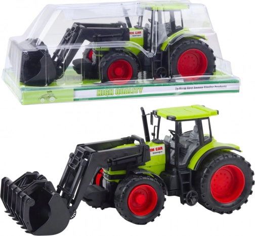 Traktor für Kinder mit grünem Schaufelgreifer-Frontlader