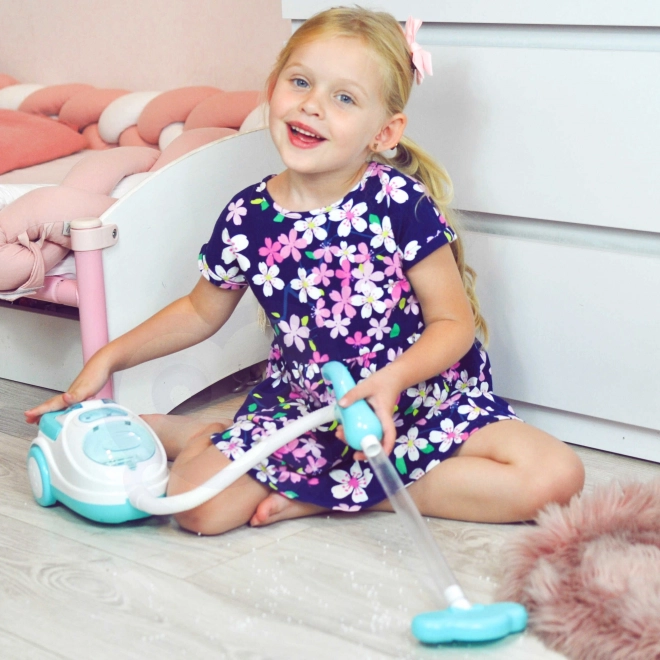 Interaktiver Kinderstaubsauger mit Saugfunktion Woopie