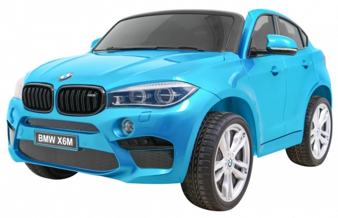 BMW X6M XXL pro 2 Kinder Blaue Farbe + Pilot + Eco-Leder + Sicherheitsgurte + Langsamer Start + MP3 + LED