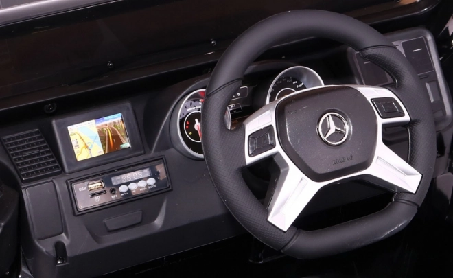 Autobatterie Mercedes AMG G65 für Kinder Weiß + Lackiert + Kofferraum + Lichter Geräusche