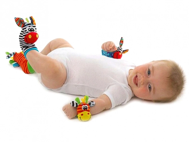 Rasselsocken- und Bandset für Babys