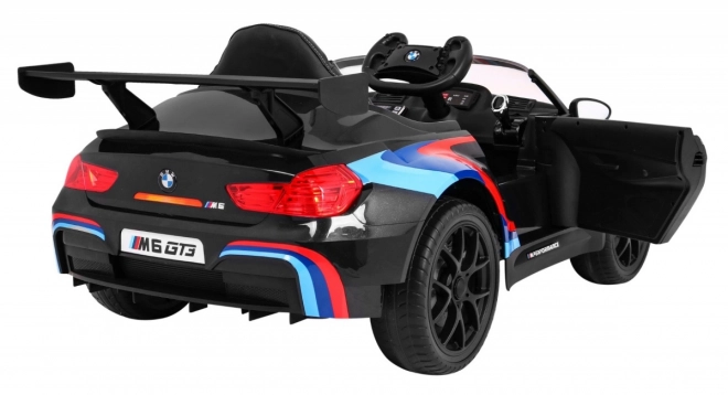 BMW M6 GT3 Spielzeugauto auf Batterie für Kinder schwarz + Belüftung + MP3-Sounds Lichter + Fernbedienung