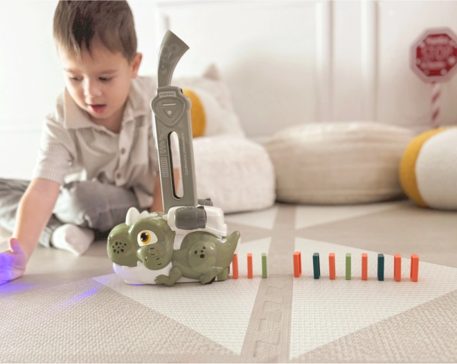 Interaktiver grüner Dinosaurier WOOPIE mit elektrischem Zug und Domino