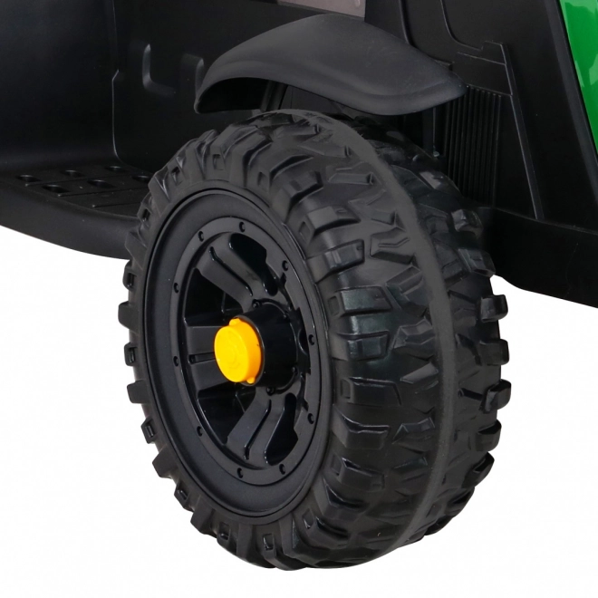 Titantraktor mit Anhänger grün