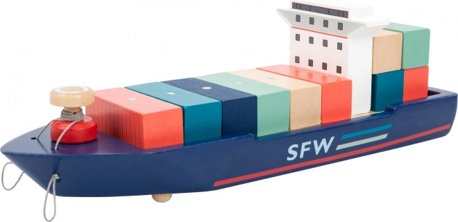 Containerschiff mit Schleppern