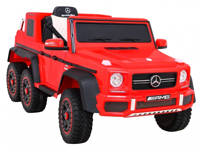 Mercedes G63 AMG Auto mit Batterie, Rot + Fernsteuerung + 6 EVA-Räder + Sanfter Start + MP3 LED