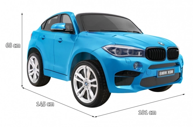 BMW X6M XXL pro 2 Kinder Blaue Farbe + Pilot + Eco-Leder + Sicherheitsgurte + Langsamer Start + MP3 + LED