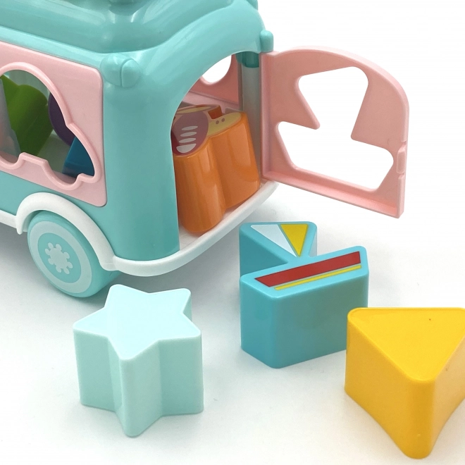 Woopie rosa Musikauto mit Sortierelementen und Zymbeln