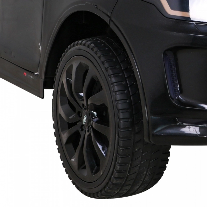 Land Rover Discovery Sport für Kinder schwarz + Fernbedienung + sanfter Start + Schaukelmodus + MP3 LED
