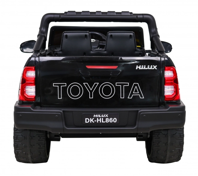 Toyota Hilux Batterie für Kinder schwarz + Antrieb 4x4 + Fernbedienung + 2 Gepäckträger + MP3-Radio + LED-Diode