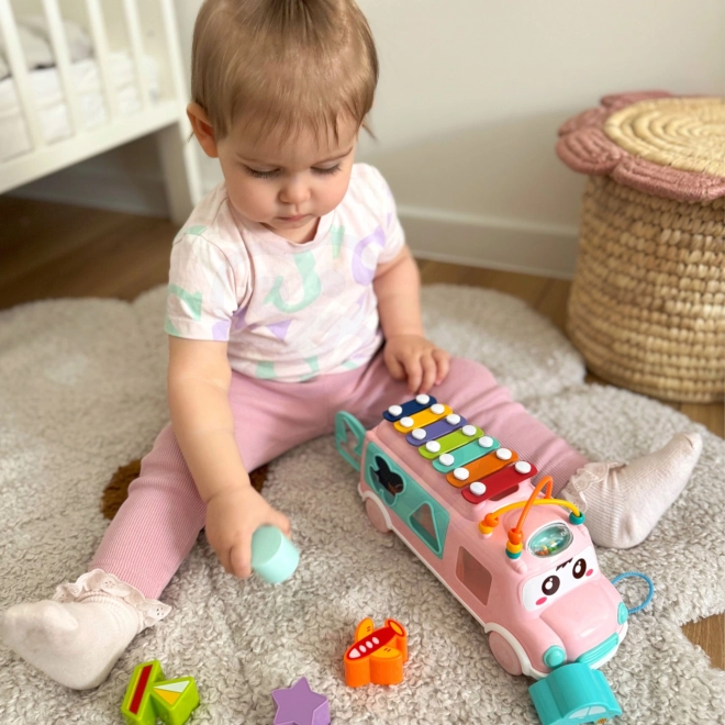 Woopie rosa Musikauto mit Sortierelementen und Zymbeln