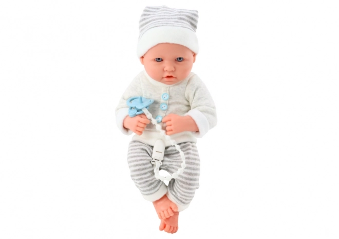 Baby Puppe mit Weiß-Grauem Streifen Outfit