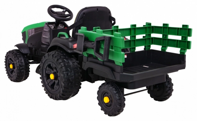 Titantraktor mit Anhänger grün