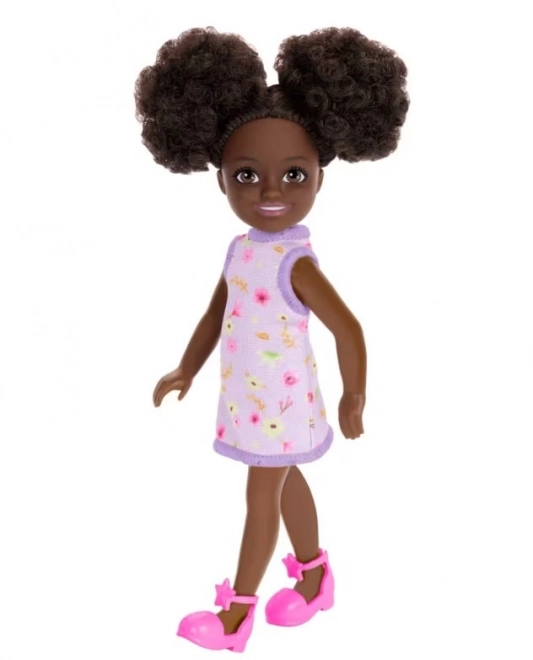 Barbie Chelsea Puppe mit lila Blumenkleid