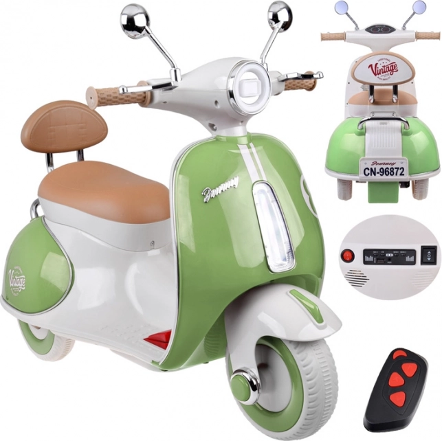 Klassischer elektrischer Kinderscooter orange – Grün