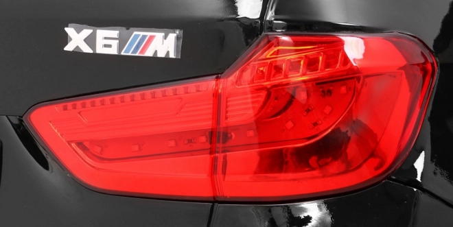 BMW X6M Elektrisches Kinderauto Schwarz + Fernbedienung + EVA + Langsamer Start + Audiopanel + LED-Diode