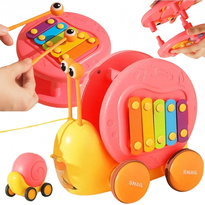 Multifunktionales WOOPIE Spielzeug Schnecke mit Xylophon und Autoabschuss