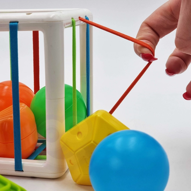Bunte flexible WOOPIE Baby Sensorik-Würfel mit Formen-Sortierer