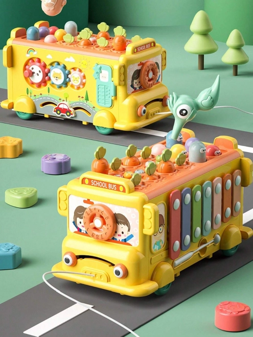 Interaktiver Montessori Schulbus mit Hammer und Xylophon