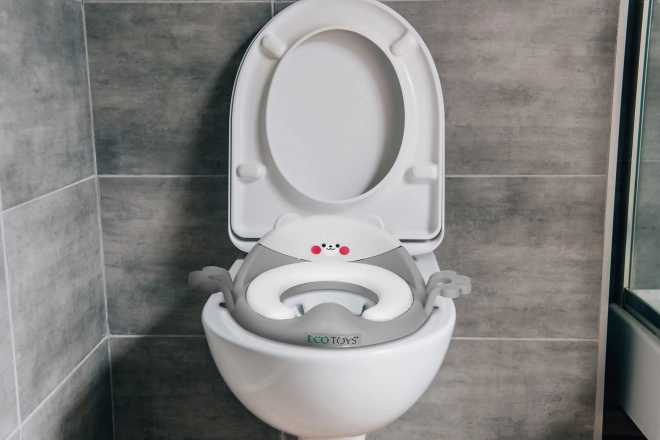 Kinder Toilettensitz mit Griffen und weichem Polster in Grau
