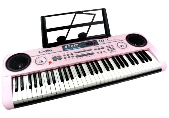 Moderner Keyboard mit Mikrofon und Netzteil in Pink