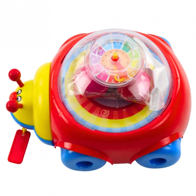 Bunte Ziehladybug mit Bällen und Uhr