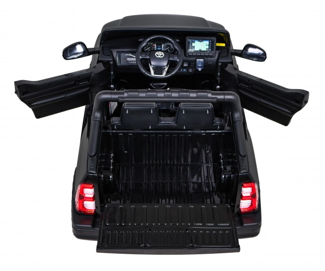 Toyota Hilux Batterie für Kinder schwarz + Antrieb 4x4 + Fernbedienung + 2 Gepäckträger + MP3-Radio + LED-Diode